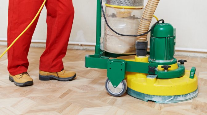 Orbital floor sander in action.