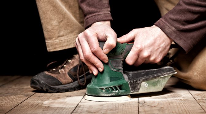 Floor Sander on wooden floor